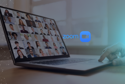 Laptop displaying people during a webinar. 